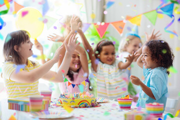Kids birthday party. Children with cake and gifts