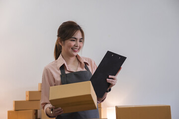 Startup small business entrepreneur SME, asian woman receive order on phone. Success young Asian...