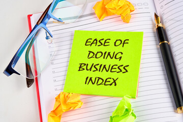 Business index concept. Copy space. Ease of doing business index symbol on a light green sticker on...