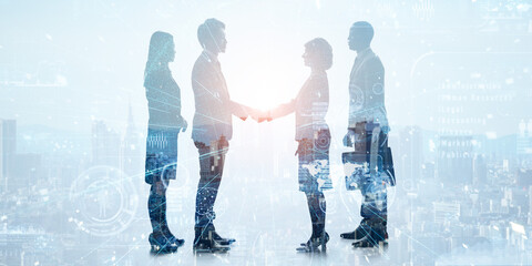 Group of businesspeople shaking hands and digital technology concept. Wide angle visual for banners or advertisements.