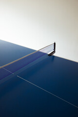 Blue indoor table tennis table. Indoor sports. Ping Pong Table. Healthy lifestyle concept.