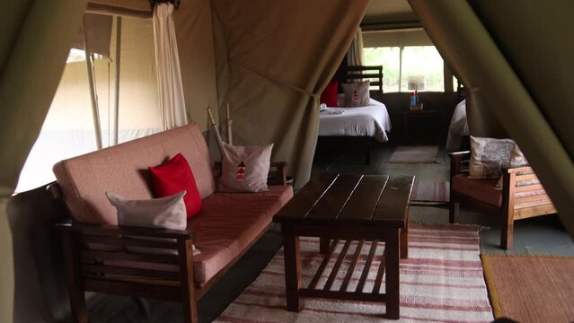interior of a luxury safari tent on safari on the Masai Mara Reserve in Kenya Africa