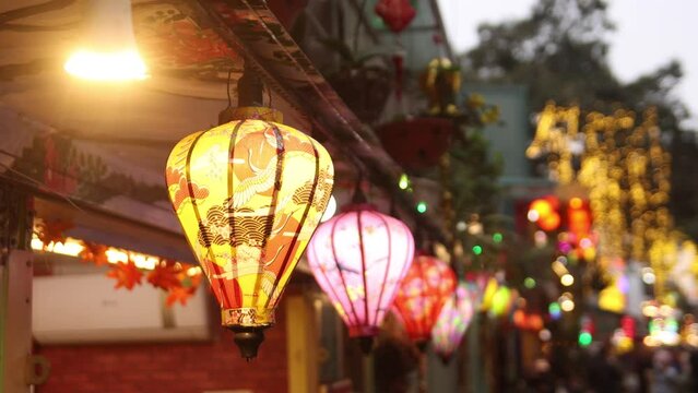 lanterns lit at night on train street in Hanoi the capital city of Vietnam in Southeast Asia