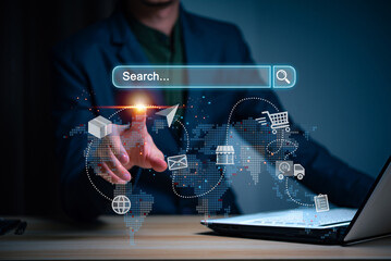 The business concept leverages digital marketing, online commerce, and AI technology. A businessman uses a laptop to plan digital marketing campaigns across digital channels including search engines.