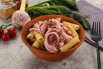 Italian cuisine - pasta tortiglioni with squid