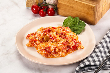 Shakshuka with tomato for breakfast
