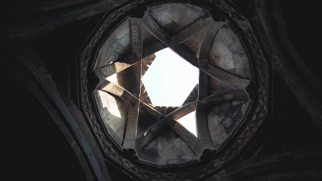 Look up the architectural dome of a synagogue or temple with a large Star of David, a modern symbol of Israel. An ancient cultural and historical object built in Armenia. Hexagram Jewish symbol