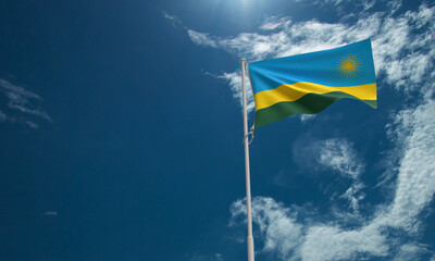 rwanda flagcopy space blue sky background wallpaper copy space rwanda government emblem celebration patriotism flagpole world international relation trade together competition independence day 1 first