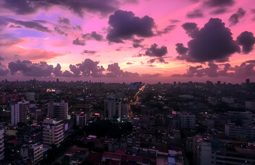  pink and purple clouds in an urban landscape, view from above