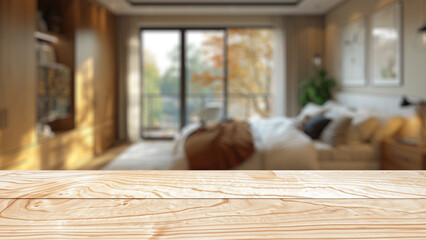 Empty wood table top with blur background of bedroom interior.
