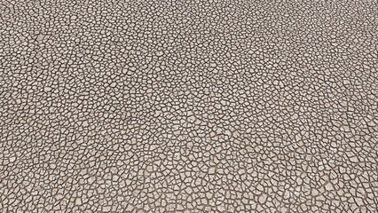 An aerial drone reveals a desolate, cracked riverbed, emblematic of relentless drought. This parched landscape starkly portrays the pressing threats of water scarcity and climate change.
