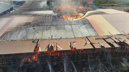 Amidst chaos and destruction, a fierce inferno engulfs the industrial site. Brave firefighters...