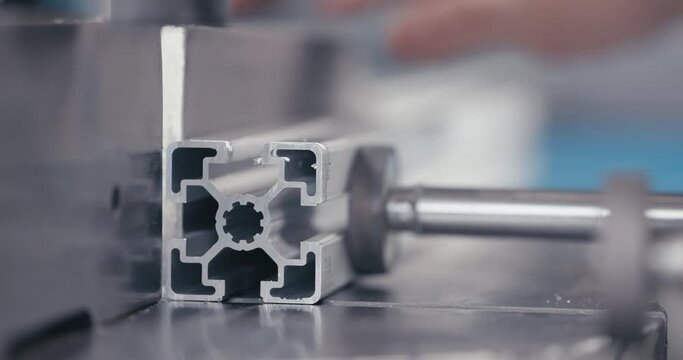 Metal sawing machine precisely cuts aluminium parts