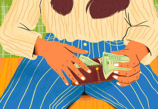 Hands of woman holding wallet with paper currency