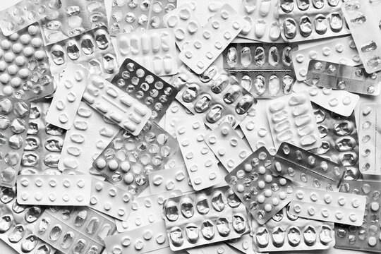 Full and empty medicine blister packs