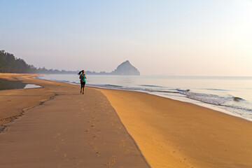 Woman exercise morning at beach Bang Boet