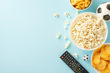 Euro 2024 snack spectacle: A delightful spread of munchies awaits football enthusiasts—chips,...