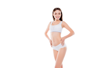 Portrait of thin slender woman with perfect body in white cotton underwear bikini isolated over white background holding hands on waist showing her ideal belly
