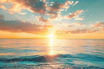 Obraz premium Sunlit rocky coastline with calm sea at sunset