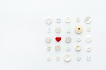 white buttons with red heart