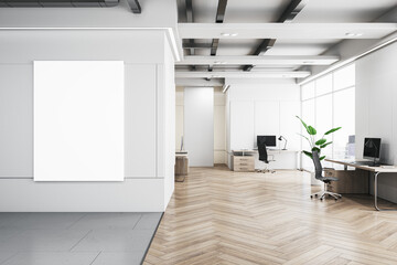 Office interior with a blank white poster frame on the wall, modern furniture, and a large window, concept of advertisement space. 3D Rendering