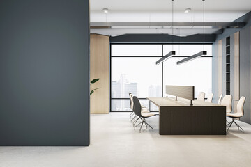 A modern office interior with a blank dark wall, desk, and chairs, large windows with a city view, concept of corporate space. 3D Rendering