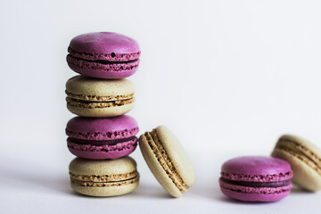colorful macaroons on wooden background