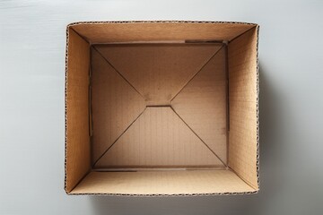 An open, empty cardboard box viewed from above, emphasizing potential and storage concept