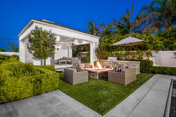 Backyard with a fire pit in a new construction home in Encino, California