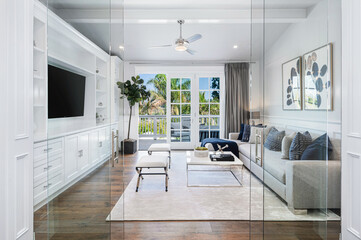 Modern living room with white furniture in a new construction home in Encino, California