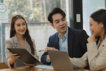 employees are discussing and exchange their idea to solve some miner problem, group of entrepreneurs is planning strategy to increase their income in the office, happy working