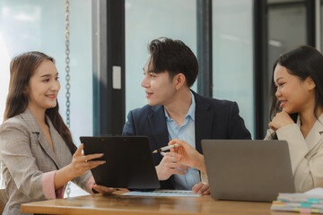 employees are discussing and exchange their idea to solve some miner problem, group of entrepreneurs is planning strategy to increase their income in the office, happy working