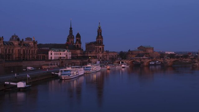 Timelapse from night to day of Elbe river and Dresden skyline