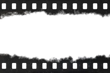 Tattered celluloid filmstrip with natural rough dust and scratches