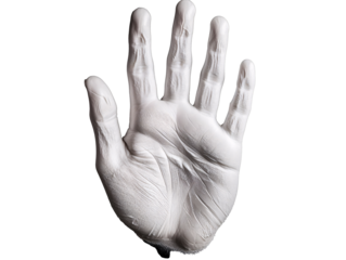 a white hand with black spots