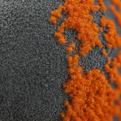 Macro zoom of a grey and fluo orange texture to use as wallpaper, backdrop or graphic resource