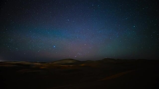 A timelapse of starry sky at Sahara desert in Morocco wide shot