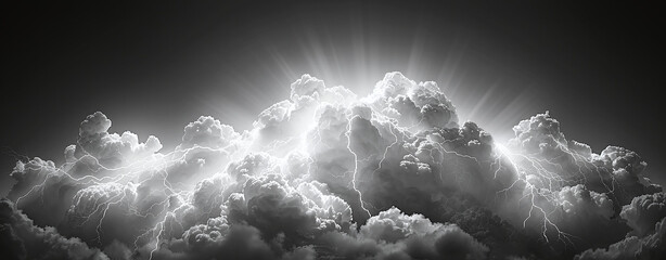 Dramatic black and white image of clouds with sun rays and lightning