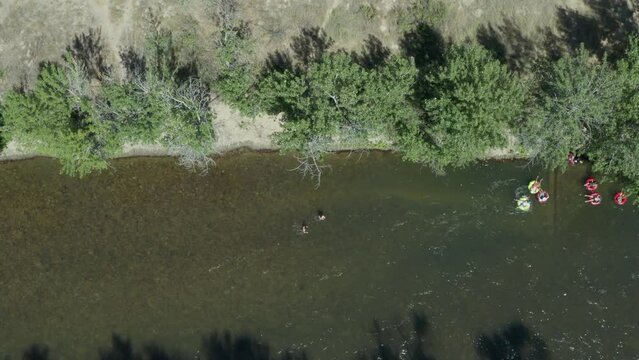 Drone footage of people floating down boise river in summer