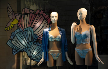 Shop window featuring two mannequins