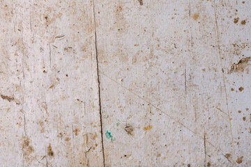 The texture of an old wooden surface covered with white paint