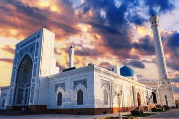 facade of modern white marble Islamic Masjid Minor Mosque in Tashkent in Uzbekistan on background...
