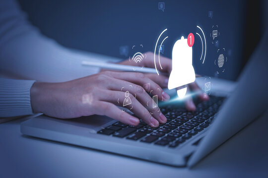 Notification bell alert of application from business communication connectivity concept for digital with email and marketing notifications. Businessman using laptop internet technology.