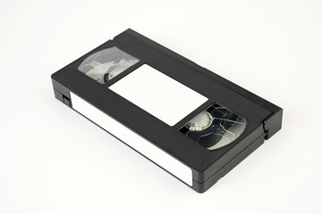 Video cassette tape on white background, close-up