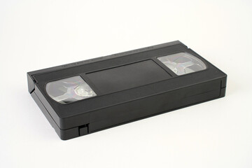 Video cassette tape on white background, close-up