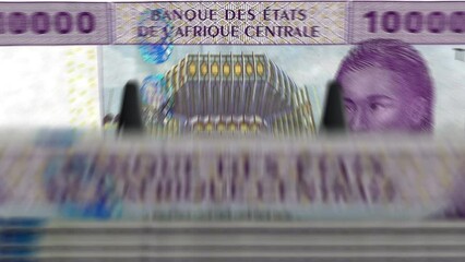 Central African CFA Franc money Cameroon Chad Congo Gabon counting machine with banknotes. Quick 10000 XAF currency note down rotation. Business and economy concept loopable seamless background. - Powered by Adobe