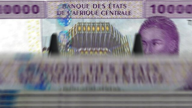 Central African CFA Franc money Cameroon Chad Congo Gabon counting machine with banknotes. Quick 10000 XAF currency note down rotation. Business and economy concept loopable seamless background.