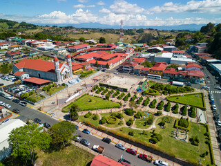 Naklejka premium Aerial view of Zarcero Park in Alajuela, Costa Rica, on a sunny day