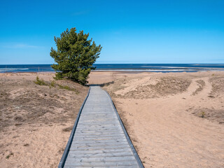 Wooden boardwalk on the Hiekkasärkät beach in Kalajoki, Finland