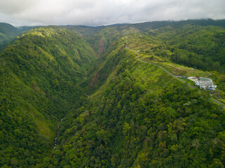 Aerial view of lush green forests covering Cinchona mountain in Heredia, Costa Rica